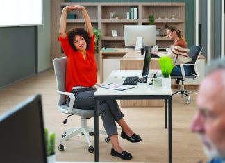 TOW_ergonomics_woman-office-stretching cmyk