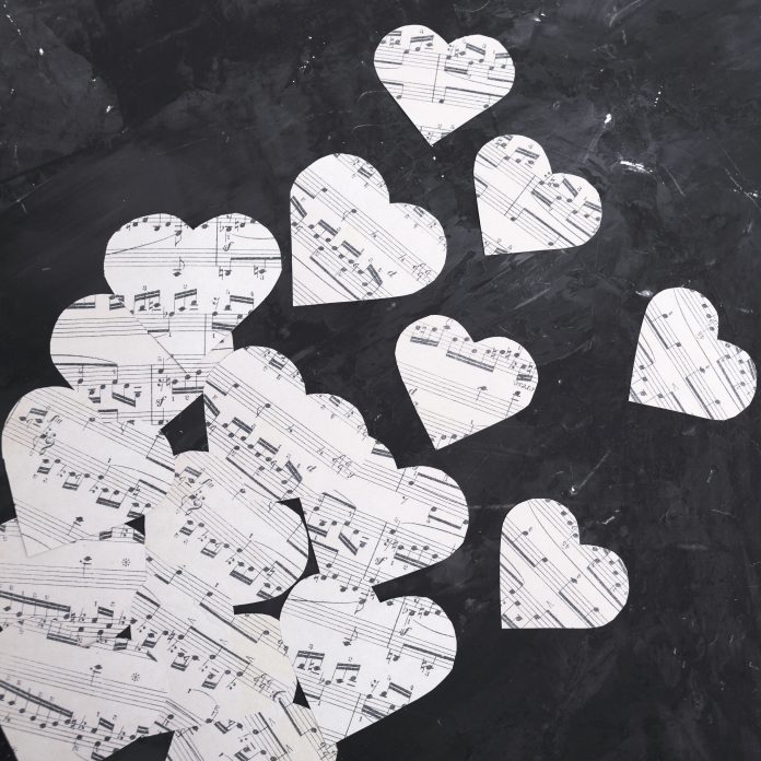 Hearts cut out of sheet music